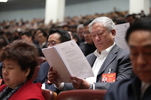 3月12日，十二屆全國人大五次會議在北京人民大會堂舉行第三次全體會議。這是全國政協(xié)委員列席會議。新華社記者 金立旺攝。