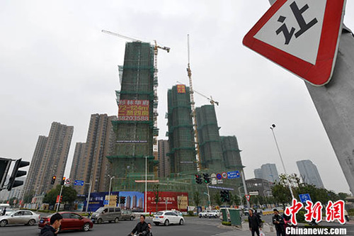 資料圖：福州一處商品房在建中。 <a target='_blank' href='http://www.chinanews.com/'>中新社</a>記者 呂明 攝