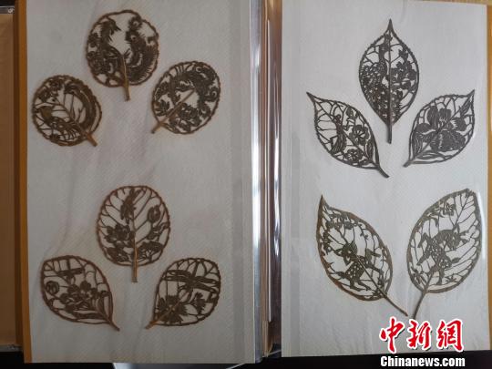 圖為，都婉莉創(chuàng)作的小型葉雕作品?！O宏瑗 攝